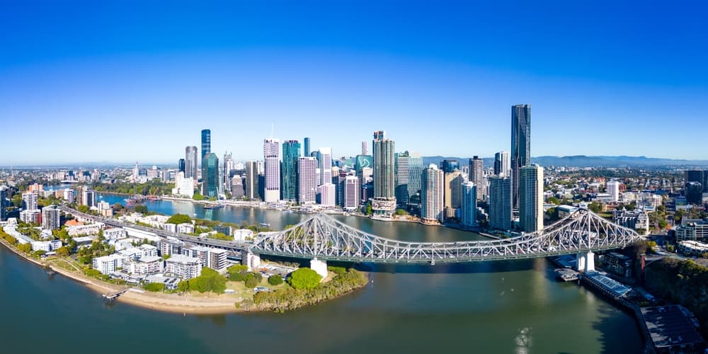 Aerial view of the Brisbane skyline and Story Bridge over the Brisbane River.